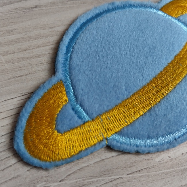 Нашивка клейова Сатурн, 100х60 мм