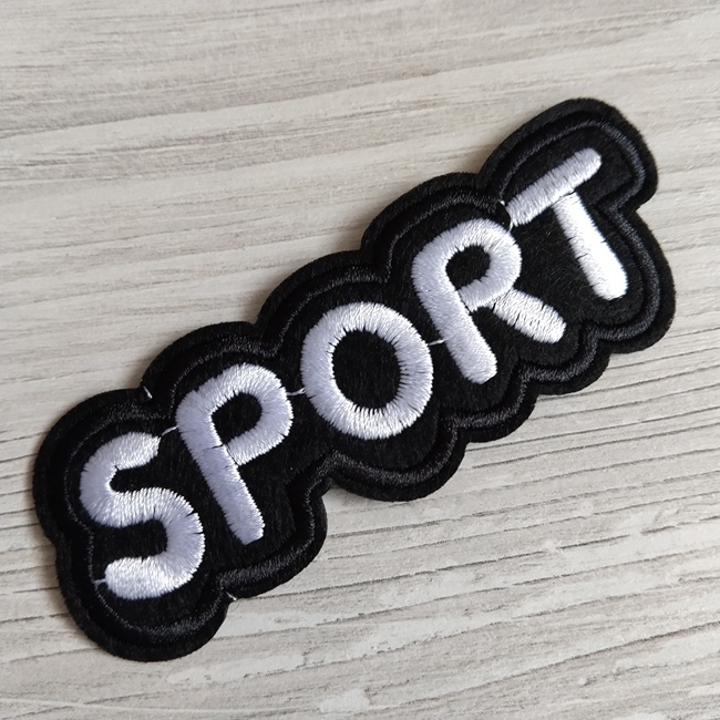 Нашивка клейова, Спорт, чорна з білим написом 95х35 мм