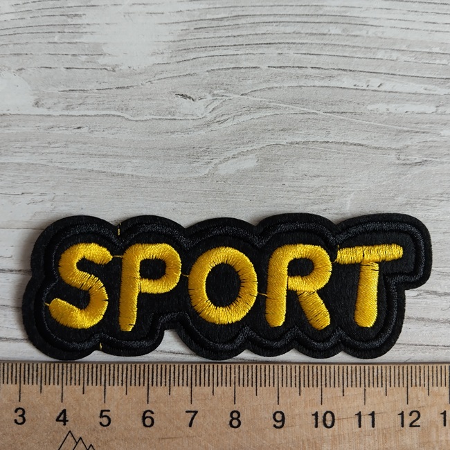 Нашивка клейова, Спорт, чорна з жовтим написом 95х35 мм