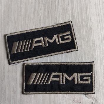 Нашивка клейова, чорна з оливковим написом 65х28 мм